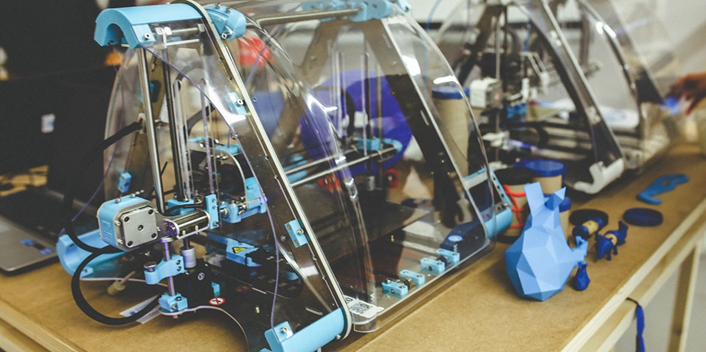 3D printers showcasing rapid prototyping technology used in modern electrical construction projects